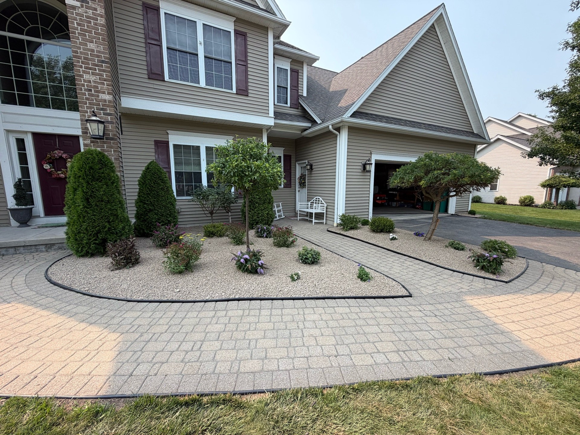 Complete landscaping tear-out, prep and reinstall of a new design (After 1)
