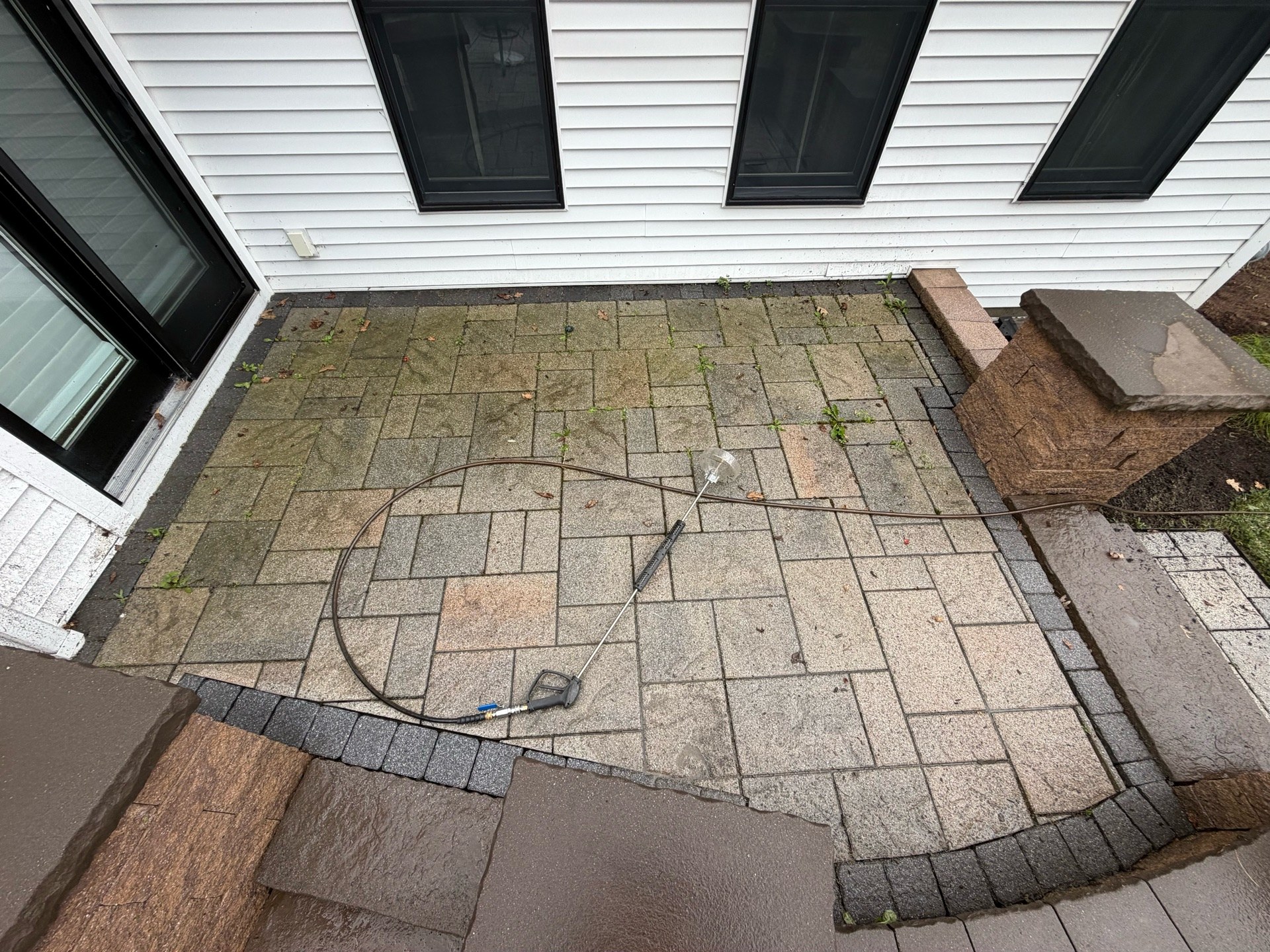 The paver patio before restoration