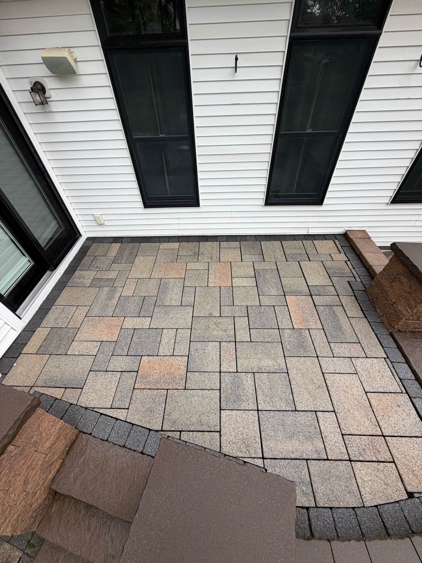 The patio cleaned and releveled